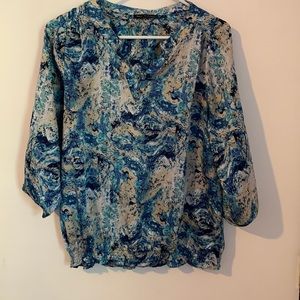 Multiple shades of blue blouse.
